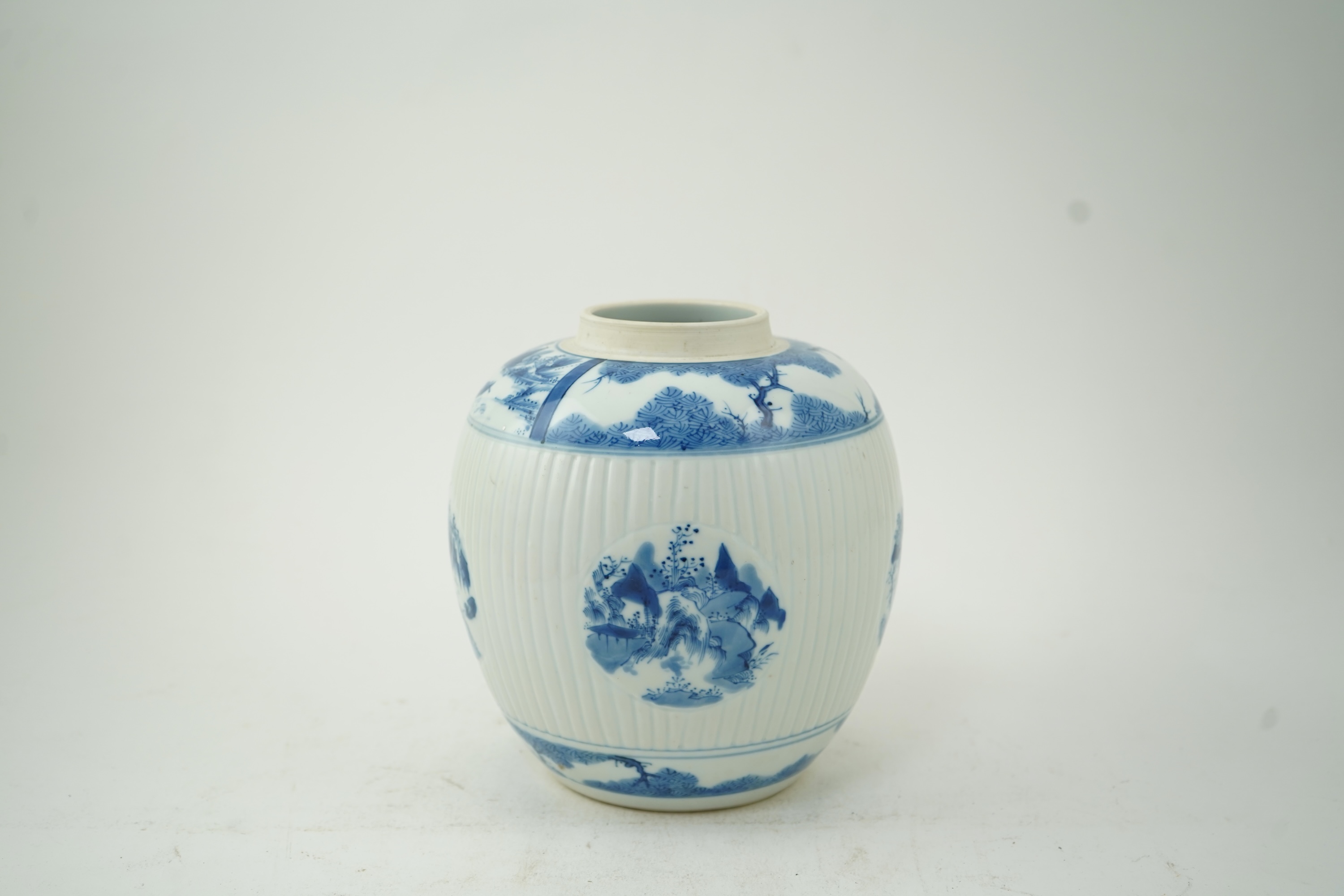 A Chinese blue and white ribbed ovoid jar, in Kangxi style, late 19th/early 20th century